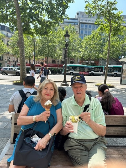 Gladys and I taken ice cream break while shopping along the world-famous Avenue des Champs-Ã‰lysÃ©es in Paris